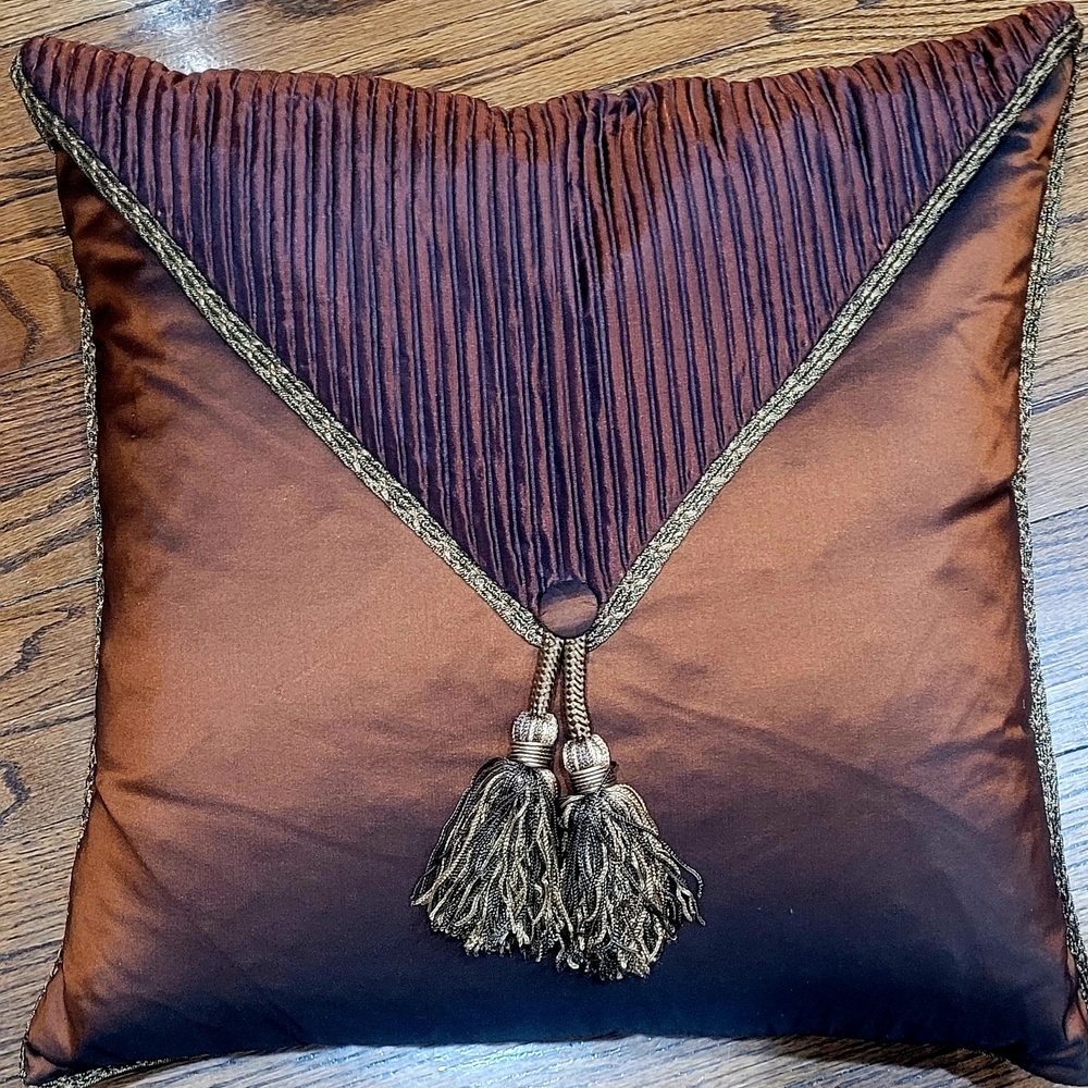MARGE CARSON. Two luxurious brown tassel pillows.